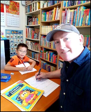 Teaching a Primary 2 student in my teaching room